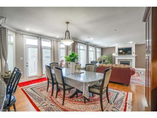 2011 Tyson Walk, London, ON - Indoor Photo Showing Dining Room With Fireplace