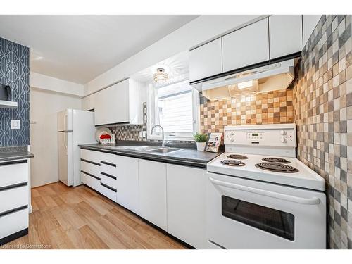 1089 Meredith Avenue, Mississauga, ON - Indoor Photo Showing Kitchen With Double Sink