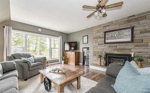 7913 Highway 7/12, Guelph/Eramosa, ON - Indoor Photo Showing Living Room With Fireplace