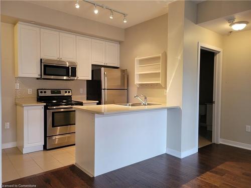 208-90 Charlton Avenue W, Hamilton, ON - Indoor Photo Showing Kitchen With Double Sink