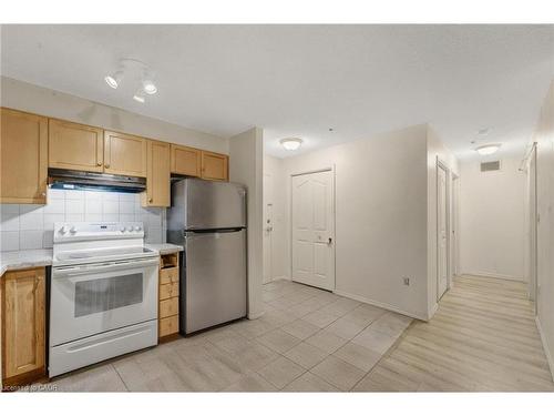 203-5225 Finch Avenue E, Toronto, ON - Indoor Photo Showing Kitchen