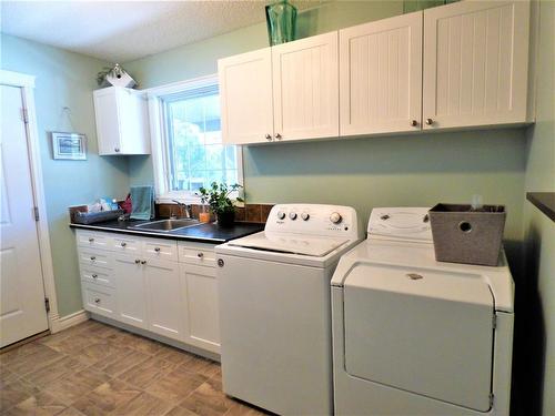 209 - 67325 Churchill Road, Lac La Biche, AB - Indoor Photo Showing Laundry Room