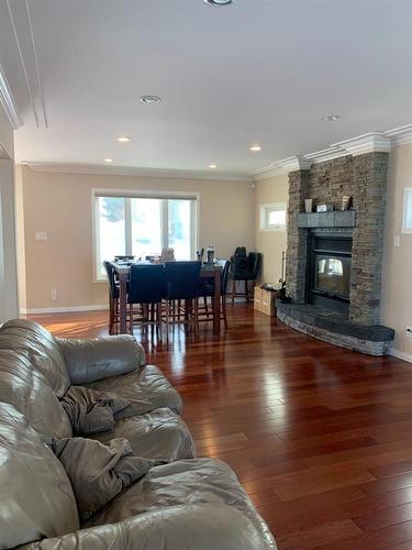 10407 Churchill Drive, Lac La Biche, AB - Indoor Photo Showing Living Room With Fireplace