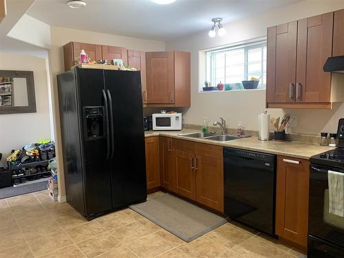 10407 Churchill Drive, Lac La Biche, AB - Indoor Photo Showing Kitchen With Double Sink