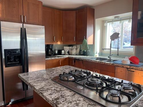 10407 Churchill Drive, Lac La Biche, AB - Indoor Photo Showing Kitchen With Double Sink