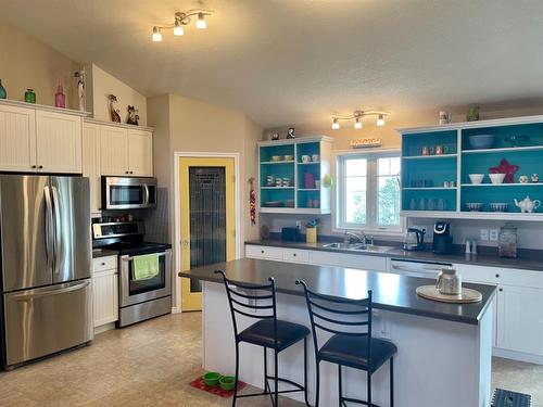 9 Moonlight Bay, Lac La Biche, AB - Indoor Photo Showing Kitchen With Double Sink