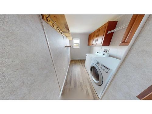 722022-Range Road 174, Wandering River, AB - Indoor Photo Showing Laundry Room