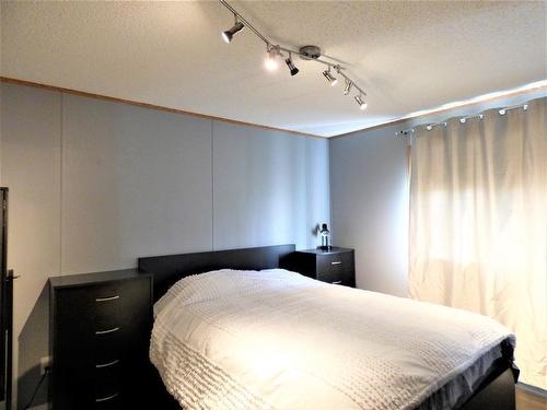 146 Woodward Crescent, Anzac, AB - Indoor Photo Showing Bedroom