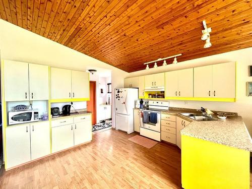 65018 Highway 36, Rural Lac La Biche County, AB - Indoor Photo Showing Kitchen With Double Sink