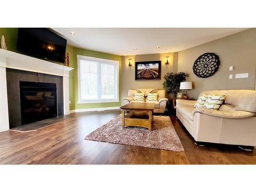 65335-153 Range Rd., Lac La Biche, AB - Indoor Photo Showing Living Room With Fireplace