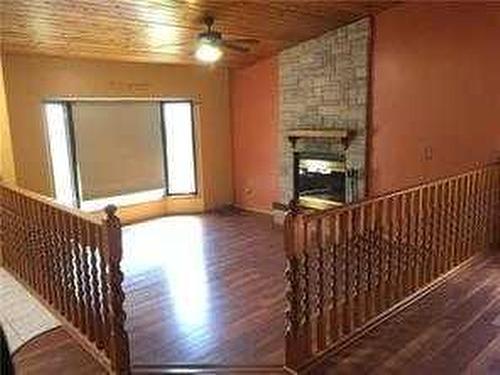 10024 103 Avenue, Lac La Biche, AB - Indoor Photo Showing Other Room With Fireplace