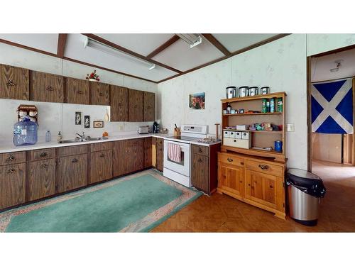 106-15538 Old Trail Rd., Lac La Biche, AB - Indoor Photo Showing Kitchen With Double Sink