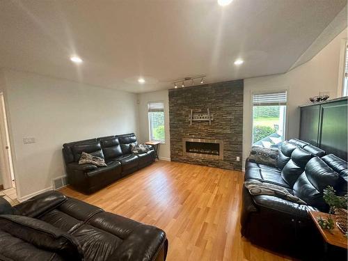 150 Laura'S Spruce Drive, Lac La Biche, AB - Indoor Photo Showing Living Room With Fireplace