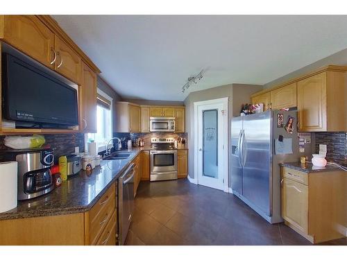 176 Diefenbaker Drive, Fort Mcmurray, AB - Indoor Photo Showing Kitchen With Stainless Steel Kitchen With Double Sink