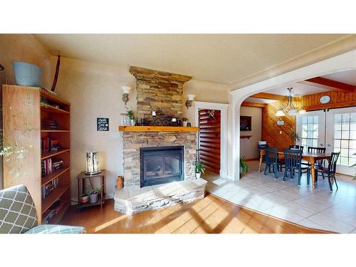 3105 Park Avenue, Mallaig, AB - Indoor Photo Showing Living Room With Fireplace