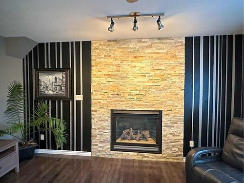 172 Berard Crescent, Fort Mcmurray, AB - Indoor Photo Showing Living Room With Fireplace