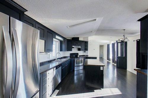 100 Arabian Drive, Fort Mcmurray, AB - Indoor Photo Showing Kitchen