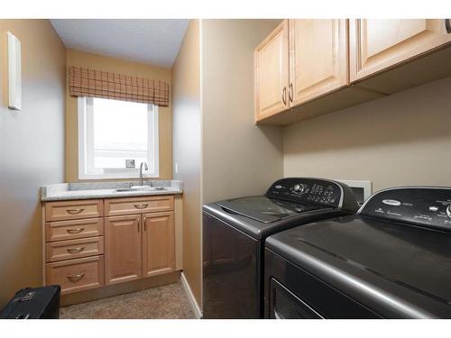 128 Wilson Bay, Fort Mcmurray, AB - Indoor Photo Showing Laundry Room