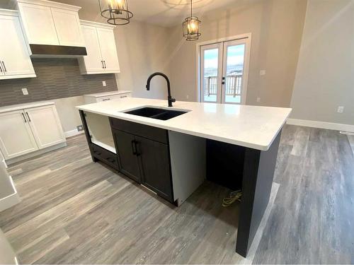 144 Manchester Way Nw, Fort Mcmurray, AB - Indoor Photo Showing Kitchen With Double Sink
