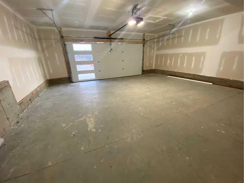 144 Manchester Way Nw, Fort Mcmurray, AB - Indoor Photo Showing Garage