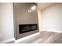 144 Manchester Way Nw, Fort Mcmurray, AB  - Indoor Photo Showing Living Room With Fireplace 
