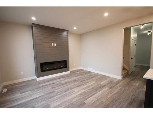 144 Manchester Way Nw, Fort Mcmurray, AB - Indoor With Fireplace