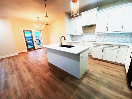 148 Manchester Way Nw, Fort Mcmurray, AB - Indoor Photo Showing Kitchen With Double Sink