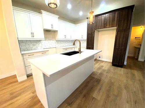 148 Manchester Way Nw, Fort Mcmurray, AB - Indoor Photo Showing Kitchen With Double Sink