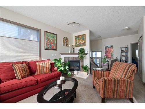 285 Grosbeak Way, Fort Mcmurray, AB - Indoor Photo Showing Living Room With Fireplace