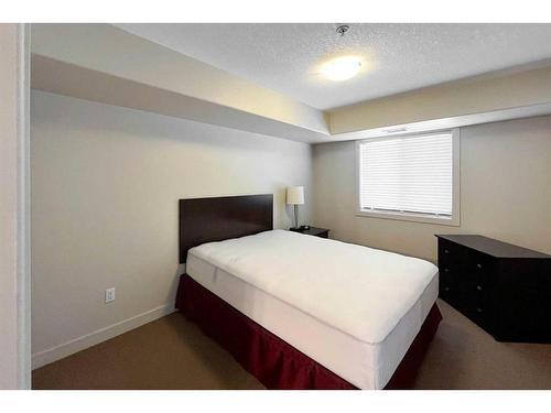 201-118 Millennium Drive, Fort Mcmurray, AB - Indoor Photo Showing Bedroom