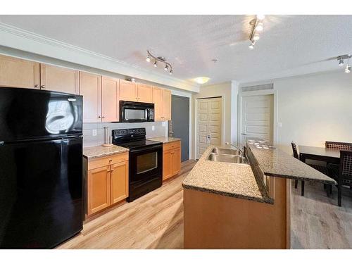 201-118 Millennium Drive, Fort Mcmurray, AB - Indoor Photo Showing Kitchen With Double Sink