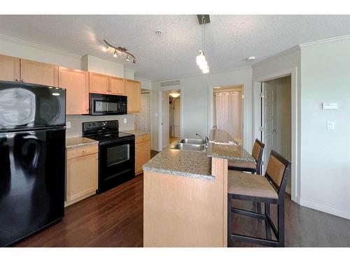 215-118 Millennium Drive, Fort Mcmurray, AB - Indoor Photo Showing Kitchen With Double Sink