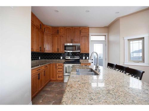 124 Woodpecker Green, Fort Mcmurray, AB - Indoor Photo Showing Kitchen With Double Sink