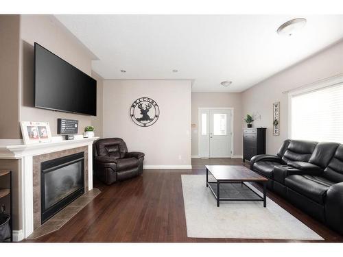 177 Diamondstone Ridge, Fort Mcmurray, AB - Indoor Photo Showing Living Room With Fireplace
