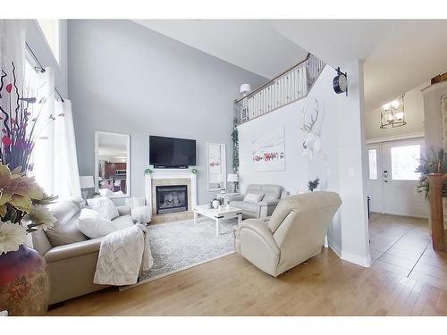 172 Pitcher Crescent, Fort Mcmurray, AB - Indoor Photo Showing Living Room With Fireplace