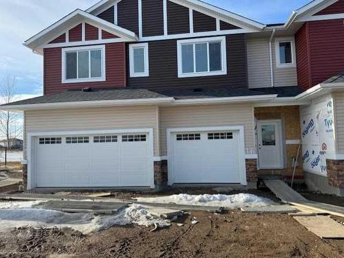 16-441 Millennium Drive, Fort Mcmurray, AB - Outdoor With Facade