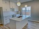 16-441 Millennium Drive, Fort Mcmurray, AB  - Indoor Photo Showing Kitchen With Double Sink 
