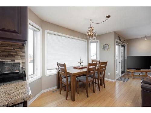 146 Smallwood Street, Fort Mcmurray, AB - Indoor Photo Showing Dining Room With Fireplace