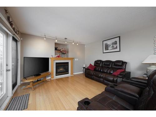146 Smallwood Street, Fort Mcmurray, AB - Indoor Photo Showing Living Room With Fireplace