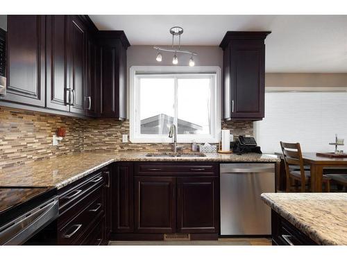 146 Smallwood Street, Fort Mcmurray, AB - Indoor Photo Showing Kitchen With Double Sink