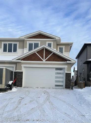 209 Siltstone Place, Fort Mcmurray, AB - Outdoor With Facade