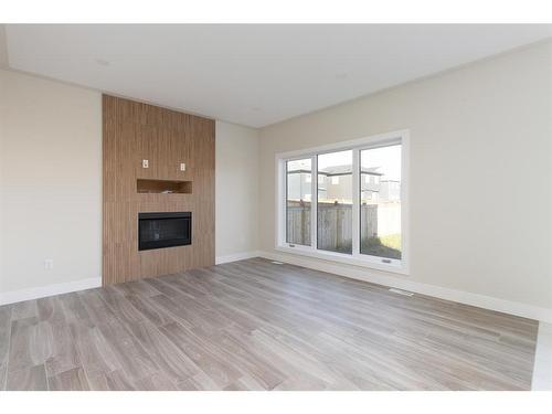 109 Athabasca Crescent, Fort Mcmurray, AB - Indoor Photo Showing Living Room With Fireplace