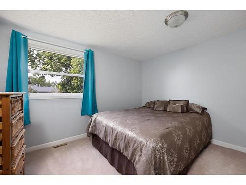 118 Farrell Cove, Fort Mcmurray, AB - Indoor Photo Showing Bedroom