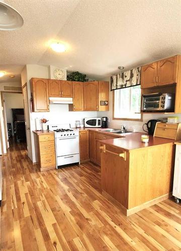237-14579 Twp. Rd. 690, Lac La Biche, AB - Indoor Photo Showing Kitchen With Double Sink