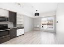 407-8106 Fraser Avenue, Fort Mcmurray, AB  - Indoor Photo Showing Kitchen 