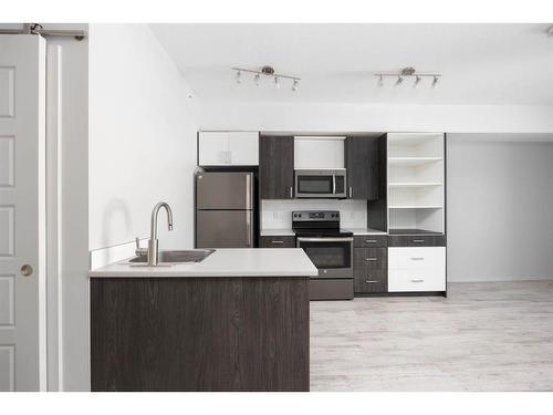 407-8106 Fraser Avenue, Fort Mcmurray, AB - Indoor Photo Showing Kitchen With Upgraded Kitchen