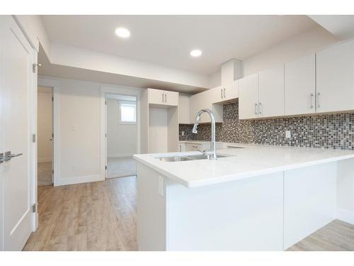 200 Siltstone Place, Fort Mcmurray, AB - Indoor Photo Showing Kitchen With Double Sink