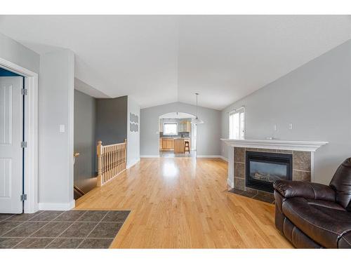 118 Pacific Crescent, Fort Mcmurray, AB - Indoor Photo Showing Living Room With Fireplace