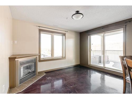 419-8535 Clearwater Drive Ne, Fort Mcmurray, AB - Indoor Photo Showing Other Room With Fireplace