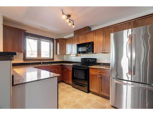 419-8535 Clearwater Drive Ne, Fort Mcmurray, AB - Indoor Photo Showing Kitchen
